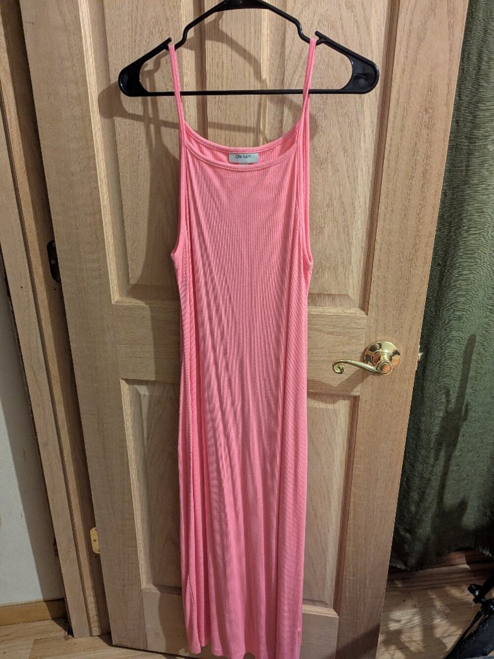 On 34th, medium size, neon pink dress. Super comfortable.